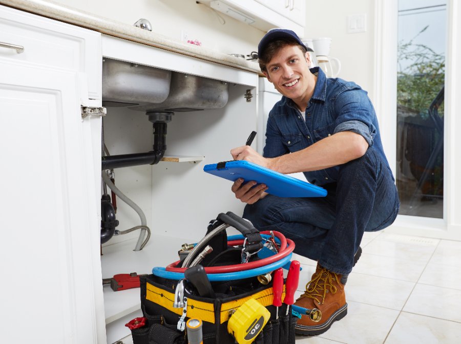 Licensed plumber documenting an under-sink inspection at a Menifee home
